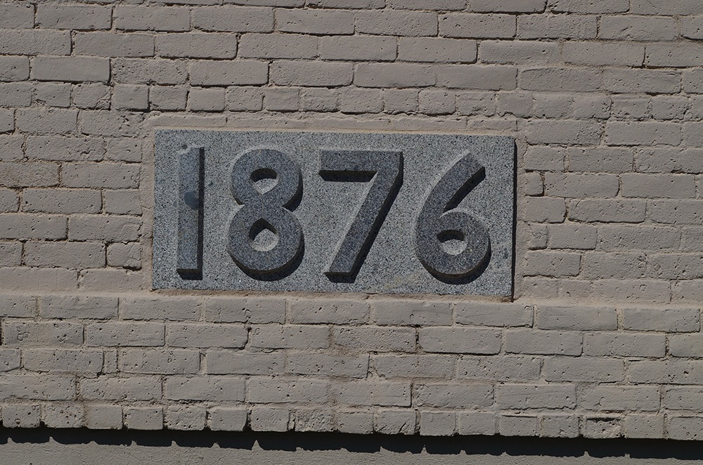 387m19