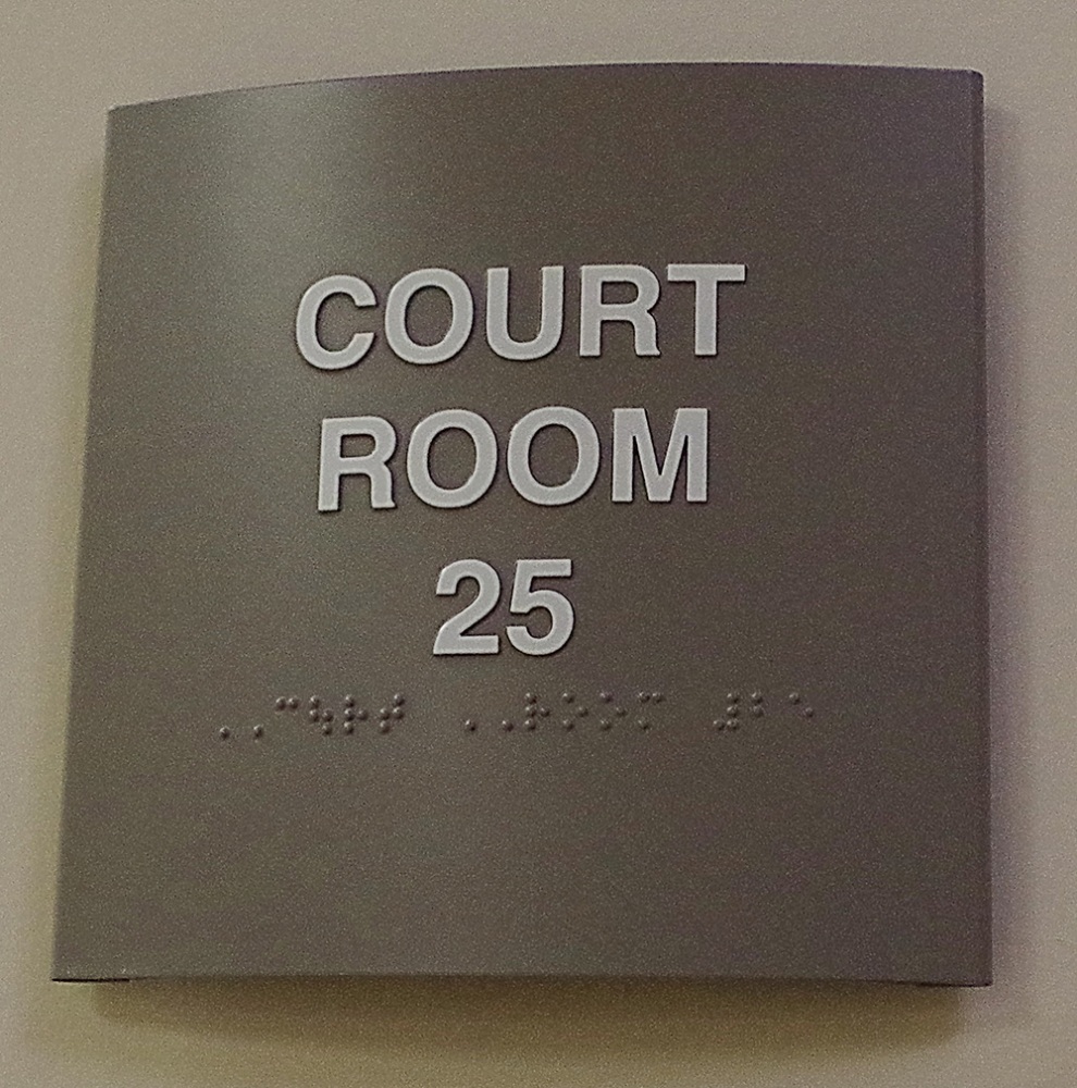 982n23
